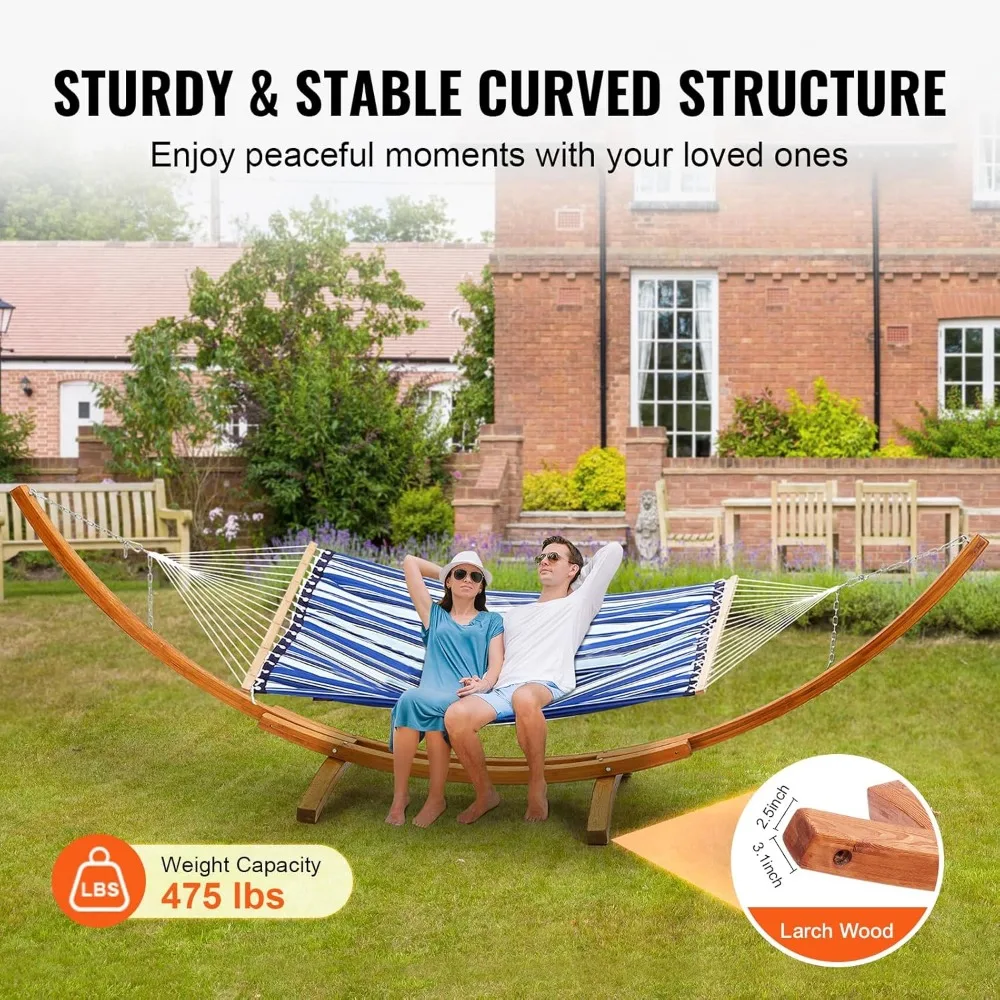 Wooden arc hammock stand showing proper width support for a two-person hammock